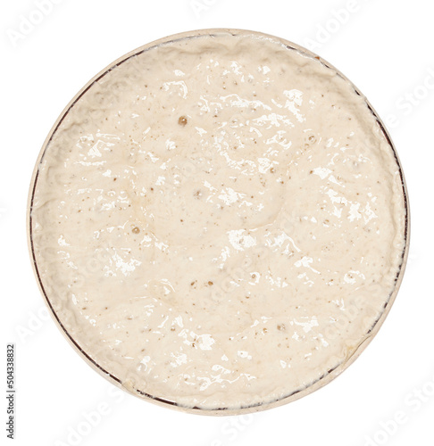 Homemade wheat sourdough for bread baking ,organic yeast for dough fermentation in bowl. Top view. Isolated on white background