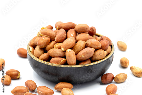 Peanuts on a white background. Healthy and fresh.nuts. Close-up.