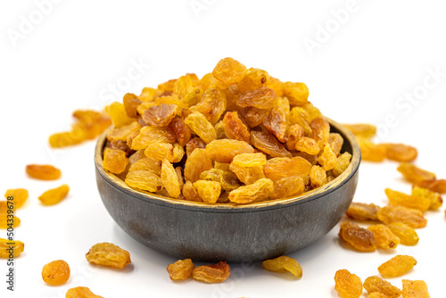 Dried raisins on a white background. Healthy and fresh.nuts. Close-up.
