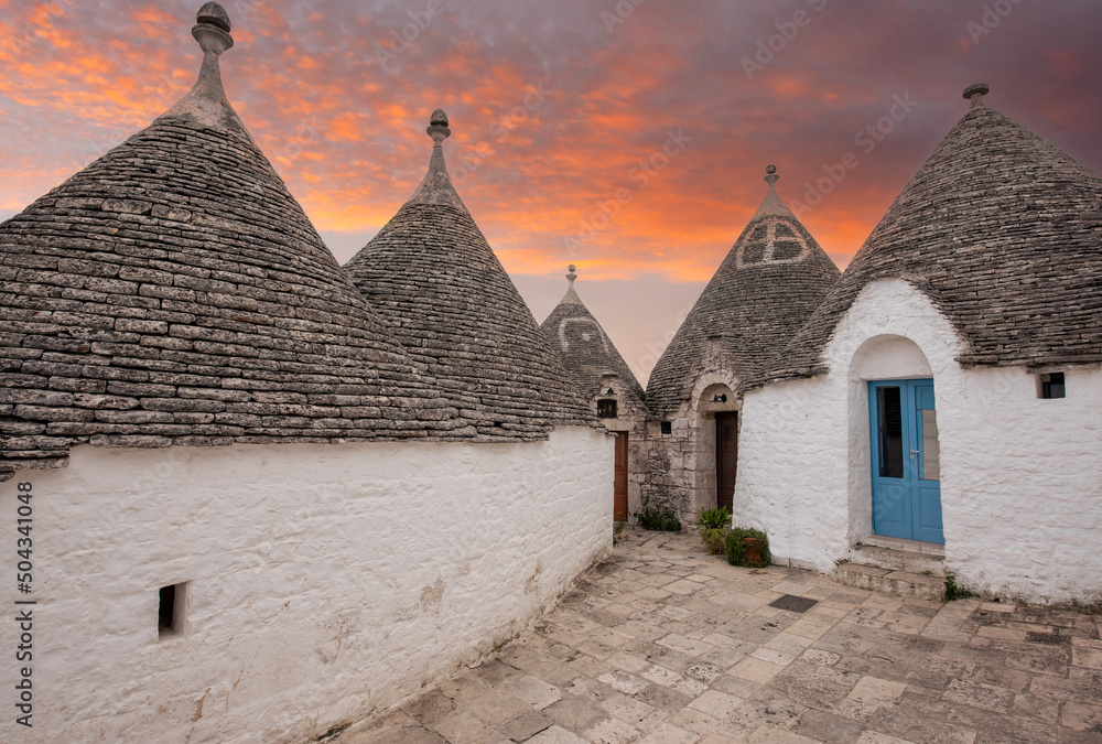 Fototapeta premium Sunset at Trulli of Alberobello, Puglia, Italy