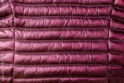 Detail of purple winter jacket, waterproof and windproof material, fabric cloth pattern