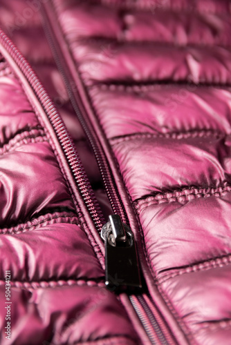 Detail of purple winter jacket, waterproof and windproof material, fabric cloth pattern