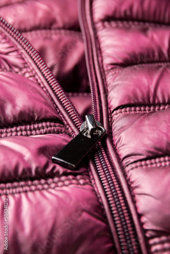 Detail of purple winter jacket, waterproof and windproof material, fabric cloth pattern