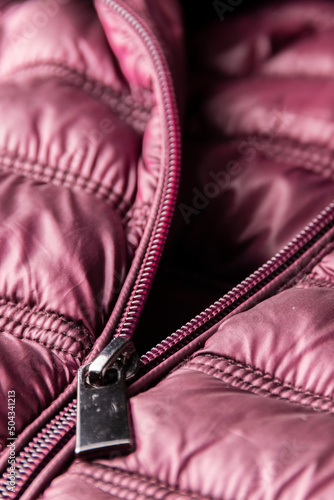 Detail of purple winter jacket, waterproof and windproof material, fabric cloth pattern