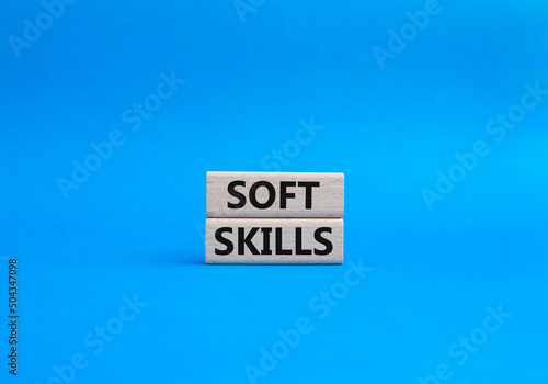 Soft skills symbol. Concept words soft skills on wooden blocks. Beautiful blue background. Business and soft skills concept. Copy space.