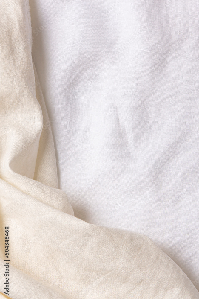 White crumpled linen fabric texture background. Natural linen organic eco textiles canvas background. Top view White crumpled linen fabric texture background. Natural linen organic eco textiles canvas background. Top view