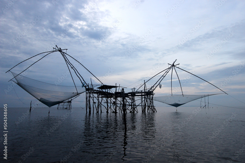 The big net used for fish trap in the lake, fisherman’s life in Phatthalung, Thailand