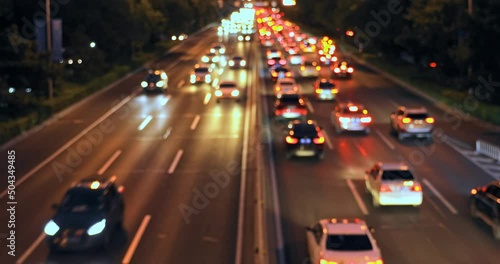 Blurred city road and vehicle scenery in Beijing at night, China. Congested city traffic at rush hour. 4K real time footage.