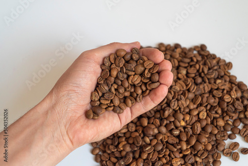 coffee beans in a hand