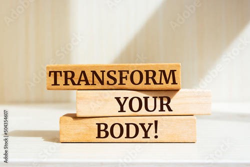 Wooden blocks with words 'Transform your Body'.