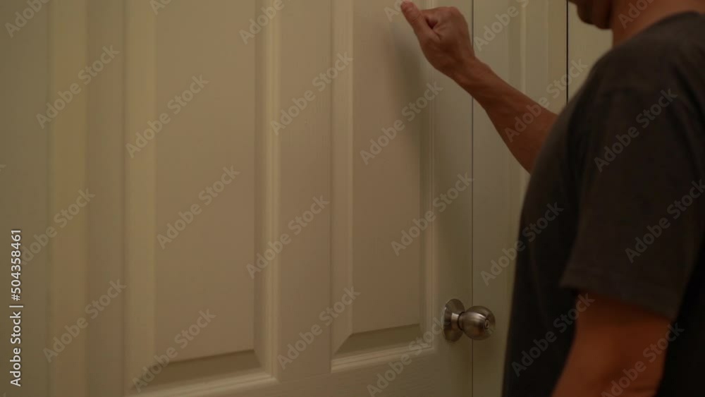 Man knocking before open the door Man knocking before open the door
