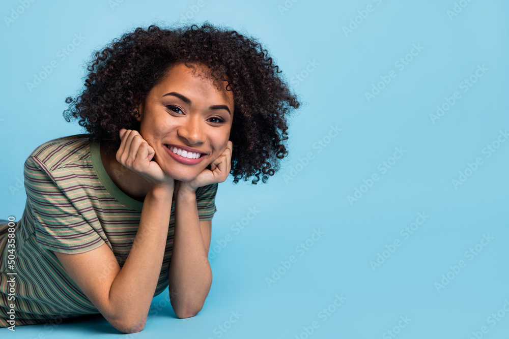 Photo of positive lady people lying enjoy white shiny smile veneers empty space isolated blue color background Photo of positive lady people lying enjoy white shiny smile veneers empty space isolated blue color background