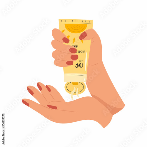 Female hand squeezes sunscreen onto her other hand
