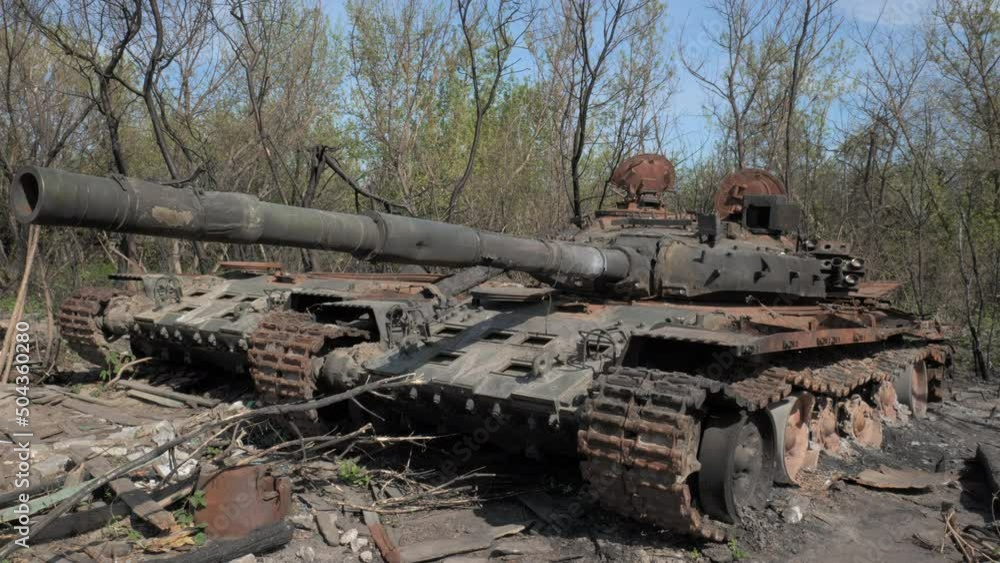 A destroyed and burnt tank of the Russian army as a result of a battle with Ukrainian troops near Kyiv, Ukraine A destroyed and burnt tank of the Russian army as a result of a battle with Ukrainian troops near Kyiv, Ukraine