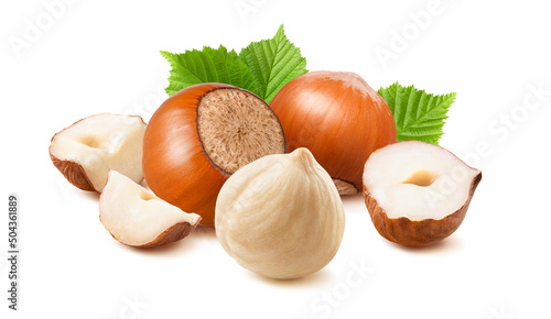 Hazelnut nuts peeled and in nutshell isolated on white background photo