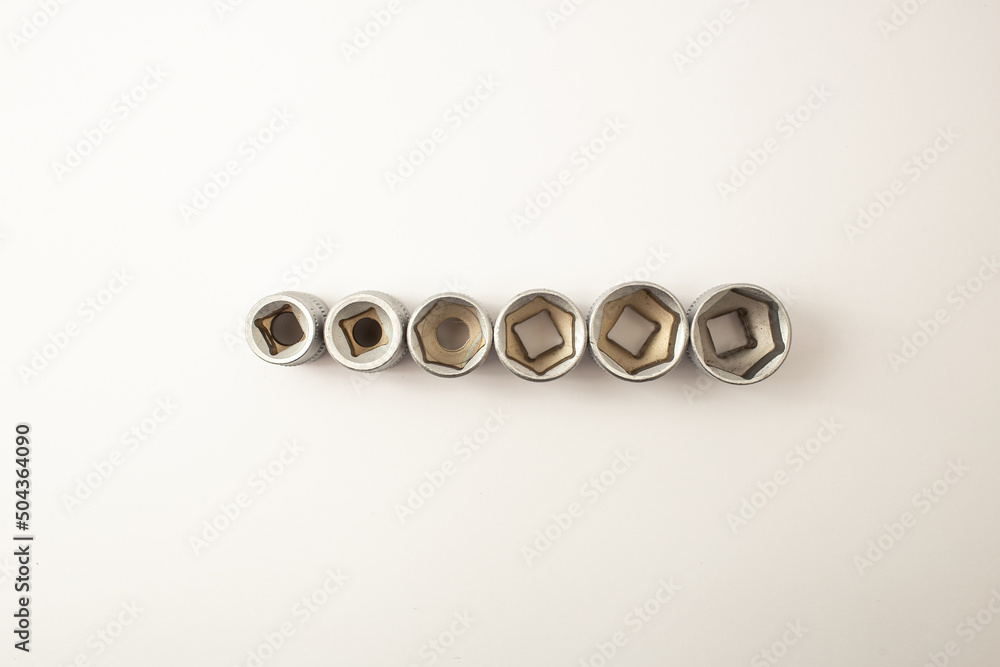 Construction tools, wrench heads on white background Construction tools, wrench heads on white background