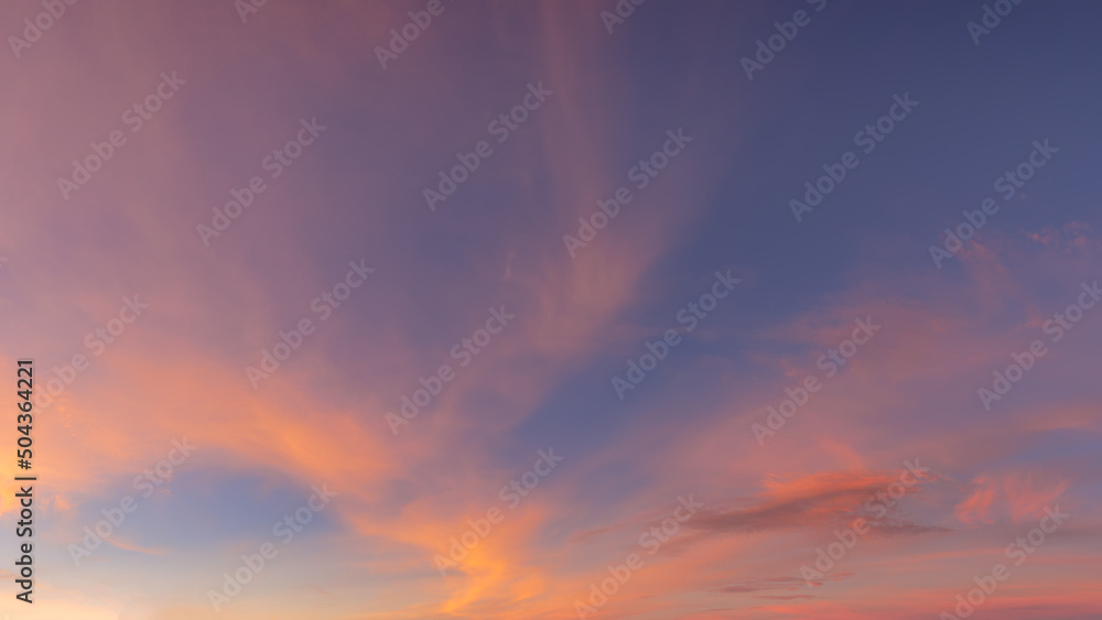 Pink orange sky with clouds at sunset as natural background.