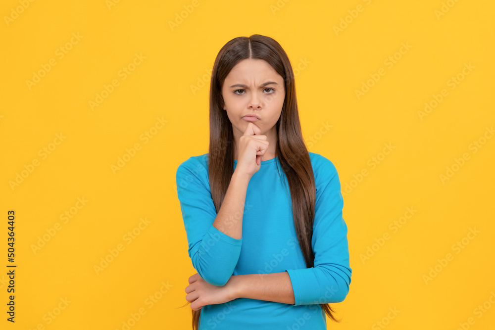 female fashion model. pretty look of young girl. face portrait of child on yellow background. female fashion model. pretty look of young girl. face portrait of child on yellow background.