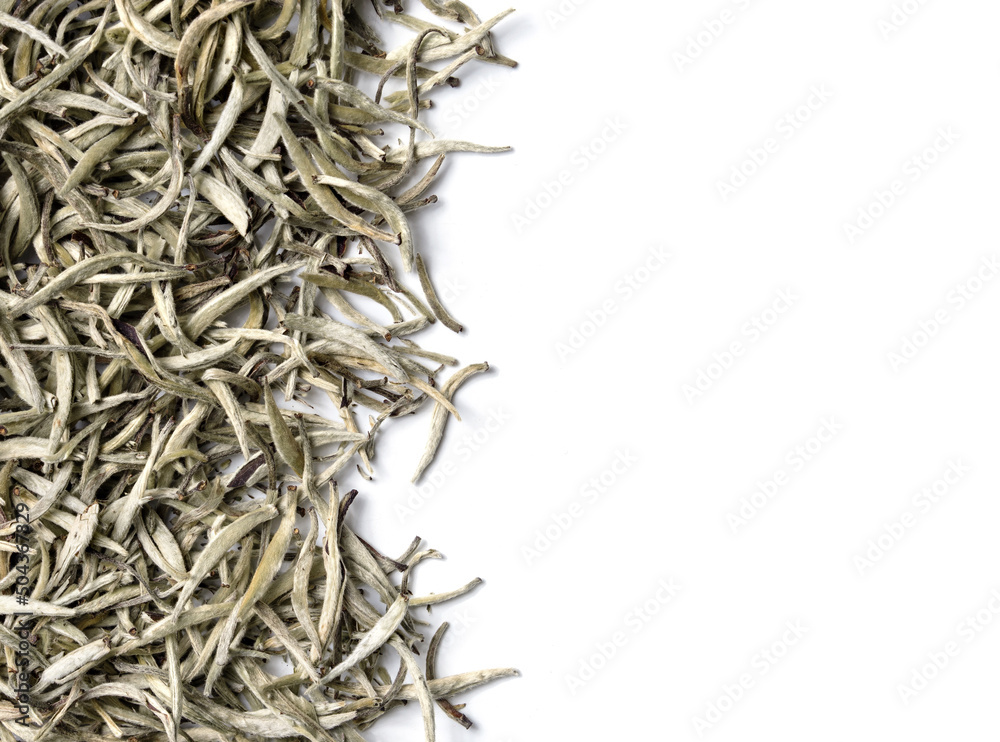 Baihao Yinzhen. White Tea Silver needles on white background. Top view. Close up. High resolution Baihao Yinzhen. White Tea Silver needles on white background. Top view. Close up. High resolution