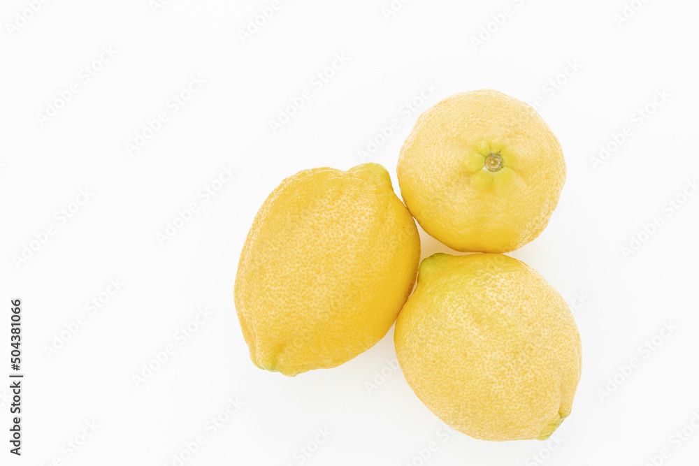 Ripe juicy lemons. Lemon fruit, citrus minimal concept, vitamin C. Creative summer minimalistic background. Flat lay, top view copy space