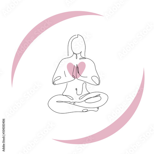 Meditating woman with heart in her hands
