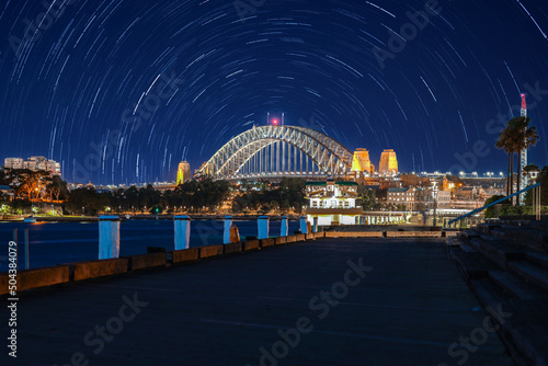 Star trails in the sky over Sydney Harbour NSW Australia startrails. lovely patterns and beautiful colours of the night.