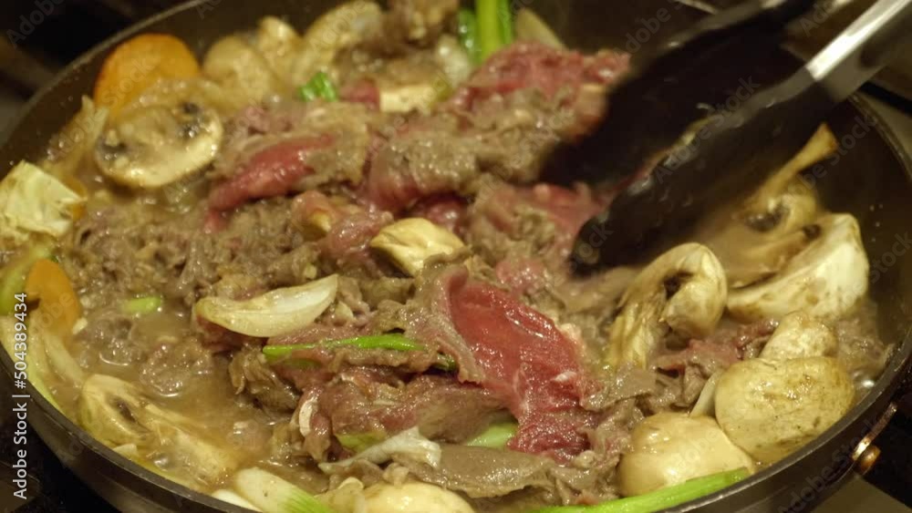 Cooking Korean Beef Hot Pot. Korean Food Bulgogi Jeongol. close up Cooking Korean Beef Hot Pot. Korean Food Bulgogi Jeongol. close up