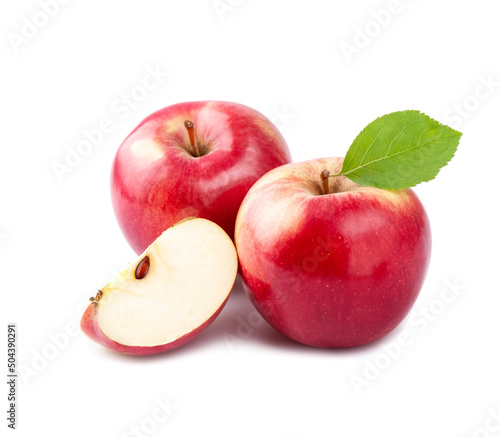 Ripe apples with leaves closeup