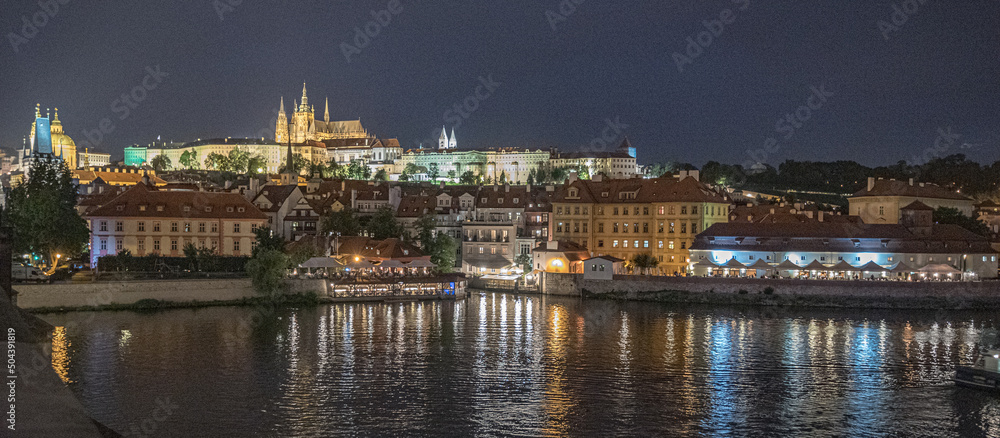Night view of  Prague Castle complex, largest in the world, Czech national symbol for more than thousand years, from Charles Bridge (Karluv Most), Prague, Czech Republic 