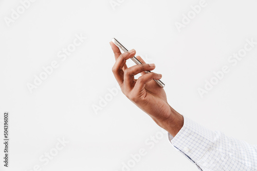 Photo of black man s hand with mobile phone