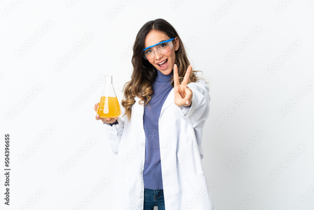 Young scientific woman isolated on white background smiling and showing victory sign Young scientific woman isolated on white background smiling and showing victory sign