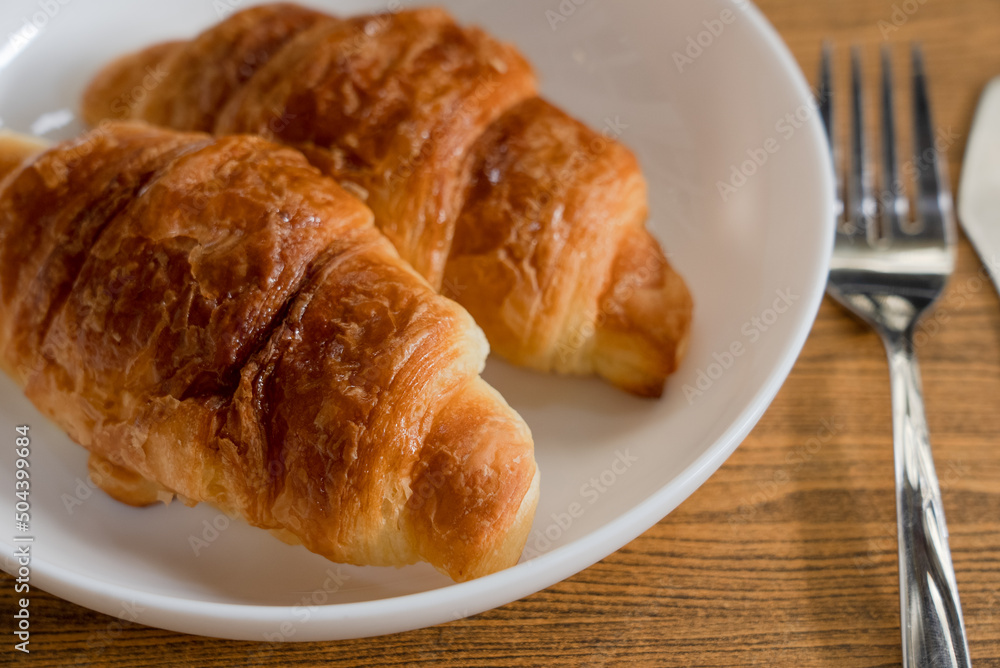 Close up of Croissants Served on Table in Restaurant for Breakfast Close up of Croissants Served on Table in Restaurant for Breakfast