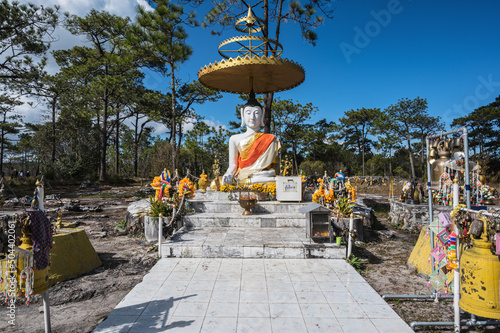 Loei.hailand-20.11.2021:Buddha statue on LanPresrinakarin on top of Phu Kradueng mountain in Loei City Thailand.Phu Kradueng national park the famous Travel destination