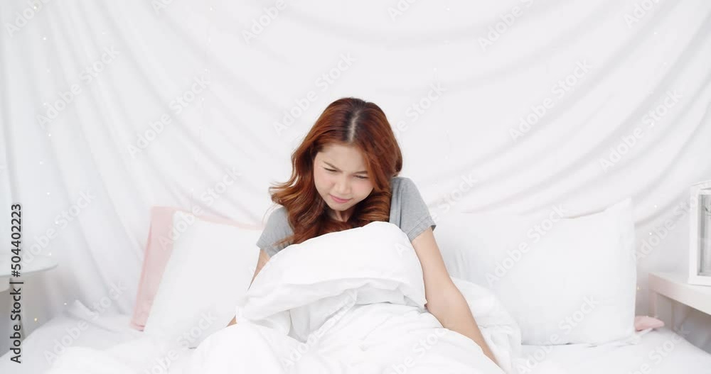 Calm young woman sleeping well in comfortable cozy fresh bed on soft pillow white linen orthopedic mattress, peaceful serene girl resting lying asleep enjoying healthy good sleep nap in the morning Calm young woman sleeping well in comfortable cozy fresh bed on soft pillow white linen orthopedic mattress, peaceful serene girl resting lying asleep enjoying healthy good sleep nap in the morning