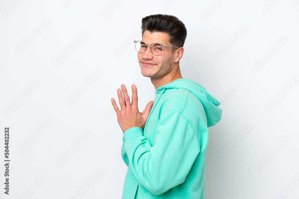 Young handsome caucasian man isolated on white bakcground scheming something Young handsome caucasian man isolated on white bakcground scheming something