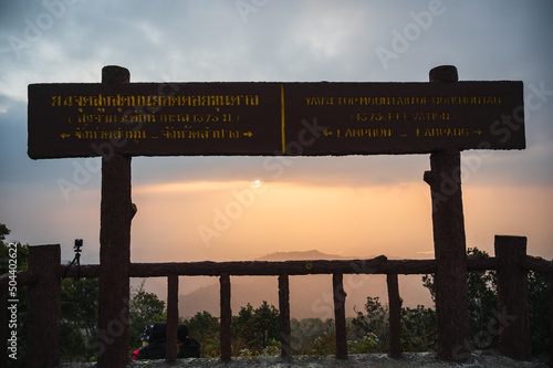 lamphun.thailand-19.12.2021:Unacquainted people with sunrise view on khuntan mountain.The Khun Than mountain range of the DoiKhun national park natural boundary between the northern Lamphun Lampang. photo