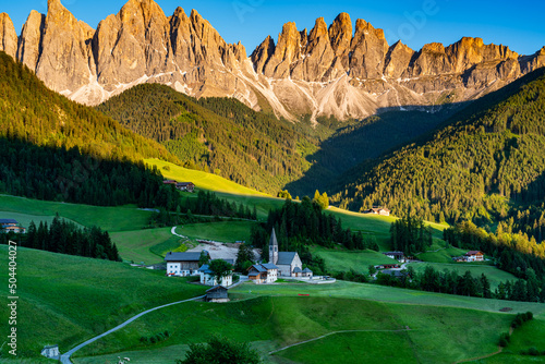 Evening light in Funes Valley or Val di Funes with the Odle Peak in the Italian Dolomite and The Famous Church of St. Magdalena in South Tyrol, Italy.