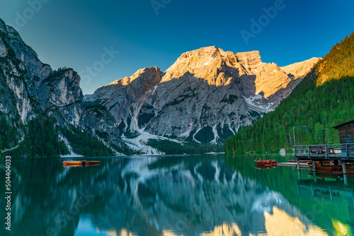 View of Seekofel Mount in The Dolomites Mountain in the morning reflecting on The Lake Braies (Lago di Braies) in Bolzano, South Tyrol, Italy.