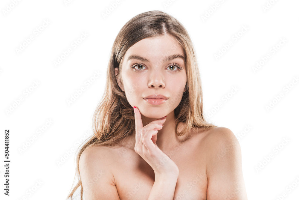 Beautiful young girl is touching her face and posing in studio on white background Beautiful young girl is touching her face and posing in studio on white background
