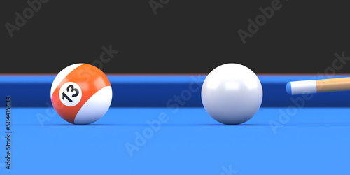 Close-up of billiard ball number thirteen in orange and white color on billiard table, snooker aim the cue ball. Realistic glossy billiard ball. 3d rendering 3d illustration photo
