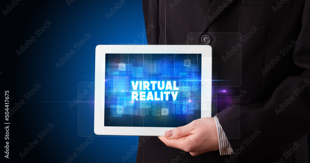Person holding tablet, technology concept Person holding tablet, technology concept