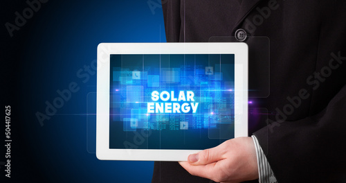 Wallpaper Mural Person holding tablet, technology concept Torontodigital.ca