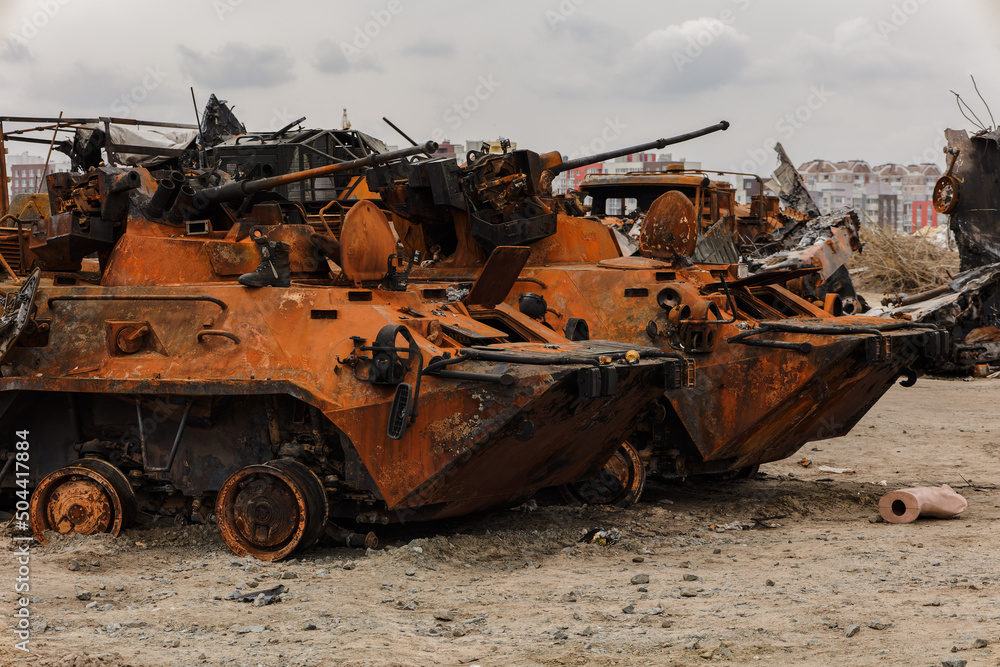 Burnt and destroyed military armored vehicles