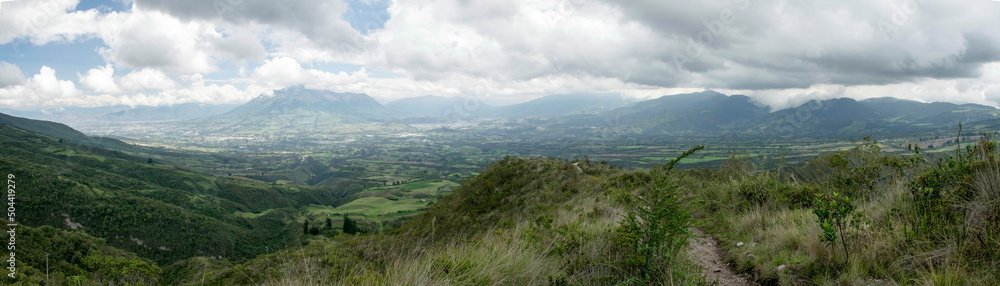 The gorgeous blue Cuicocha lake inside the crater of Cotacachi volcano as seen from the best viewpoint of the hike