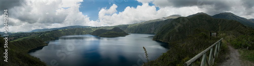 Fototapeta Naklejka Na Ścianę i Meble -  The gorgeous blue Cuicocha lake inside the crater of Cotacachi volcano as seen from the best viewpoint of the hike