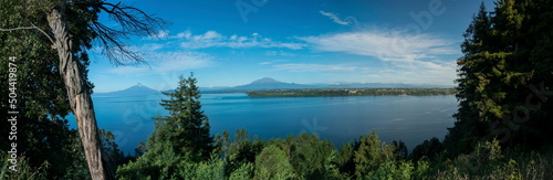 A landscape view of the Osorno and Calbuco volcano at sunrise by the Llanquihue Lake, Puerto Varas