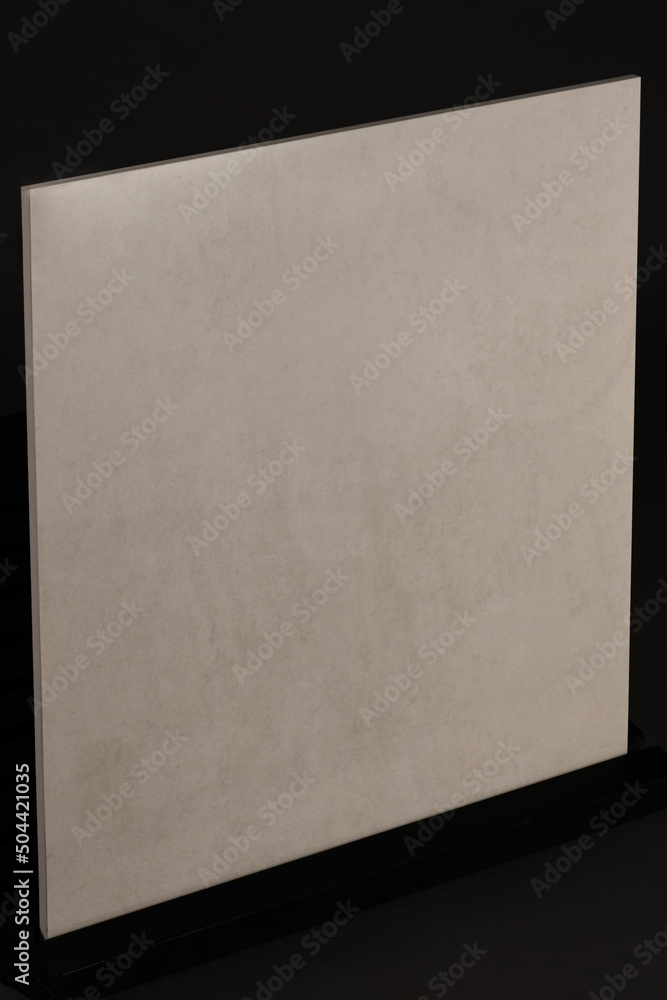 Fototapeta premium Porcelain tiles with a stone texture on a dark gray background