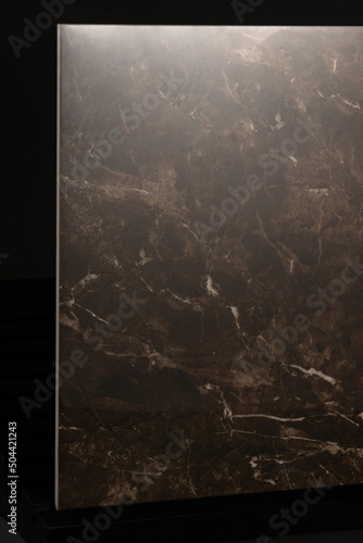 Porcelain tiles with a stone texture on a dark gray background