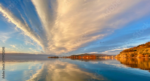 Golden rays of sunset reflecting on Ohrid Lake in North Macedonia