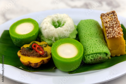 Various type of Malaysian traditional dessert - Kuih Nona Manis, Bingka, Ketayap, Puteri Ayu and Cara Berlauk photo
